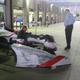 One deeply angry Dale Coyne (in the light blue shirt) surveys Vautier’s car.